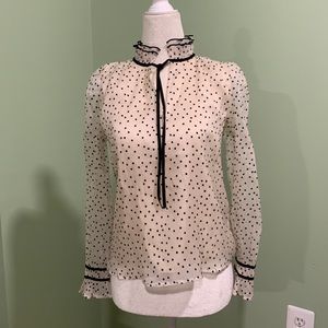 Beautiful polka dot blouse new with tags.